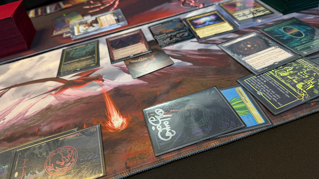 MTG Card game with fantasy-themed cards on a dragon themed playmat