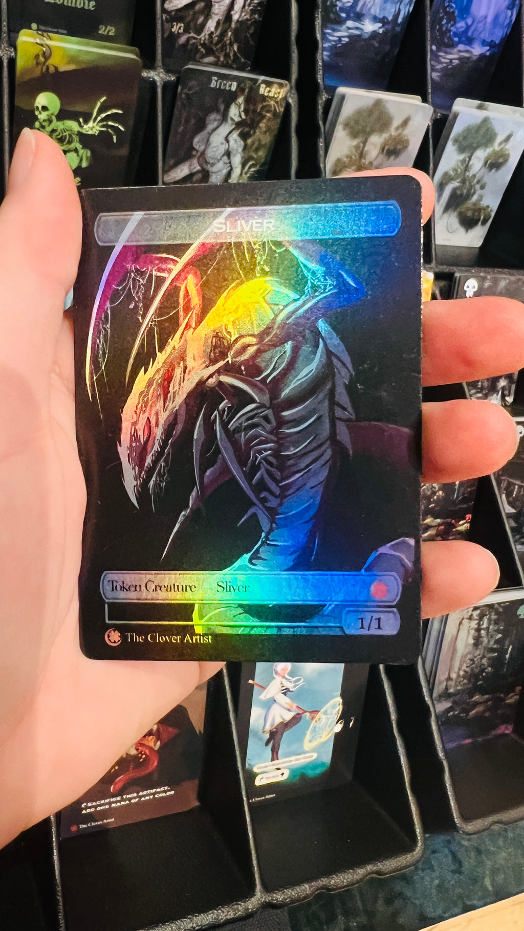 hand hold a foil sliver token mtg 