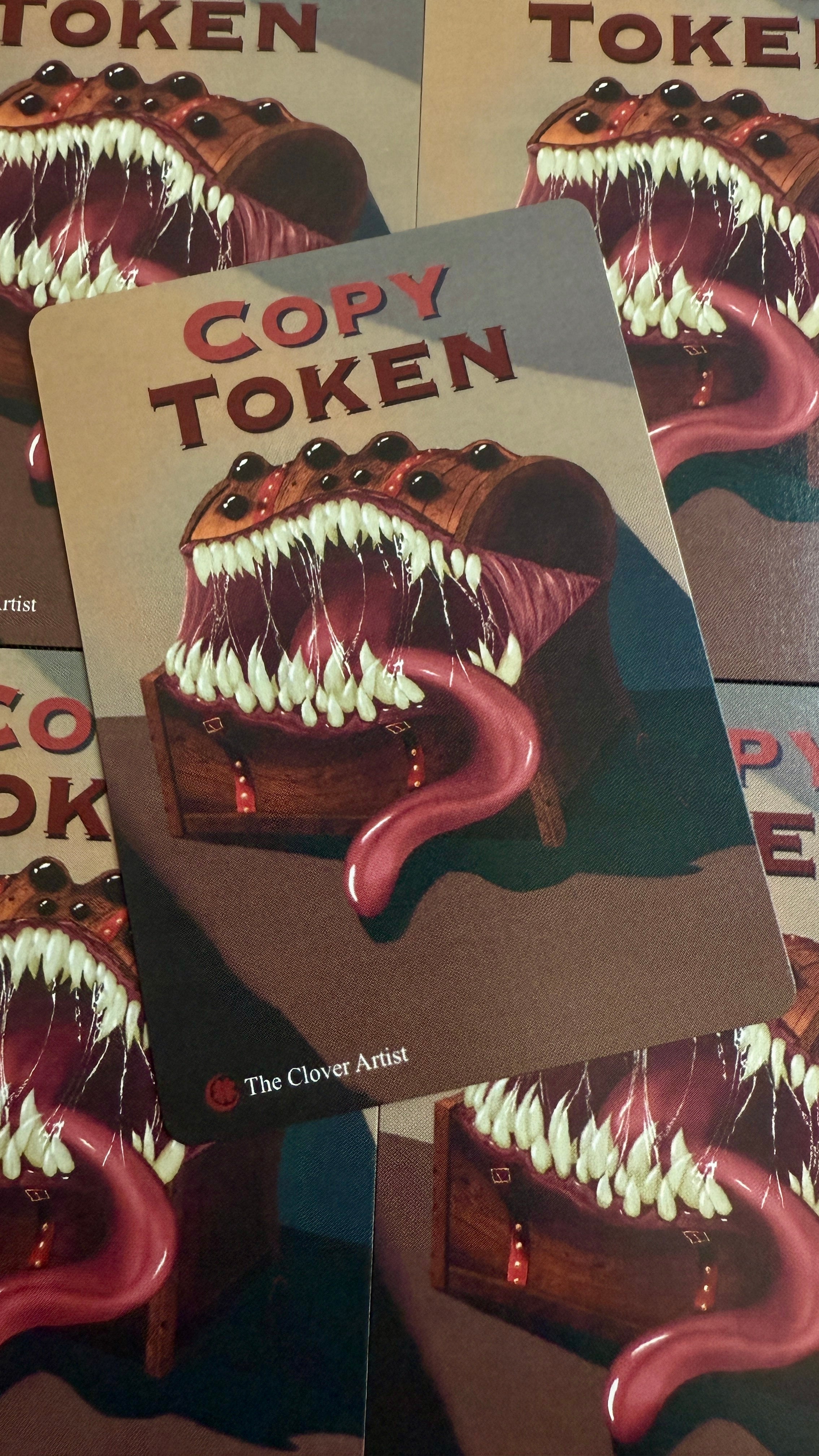 Card with a creature design labeled 'Copy Token' on a matching background by the clover artist