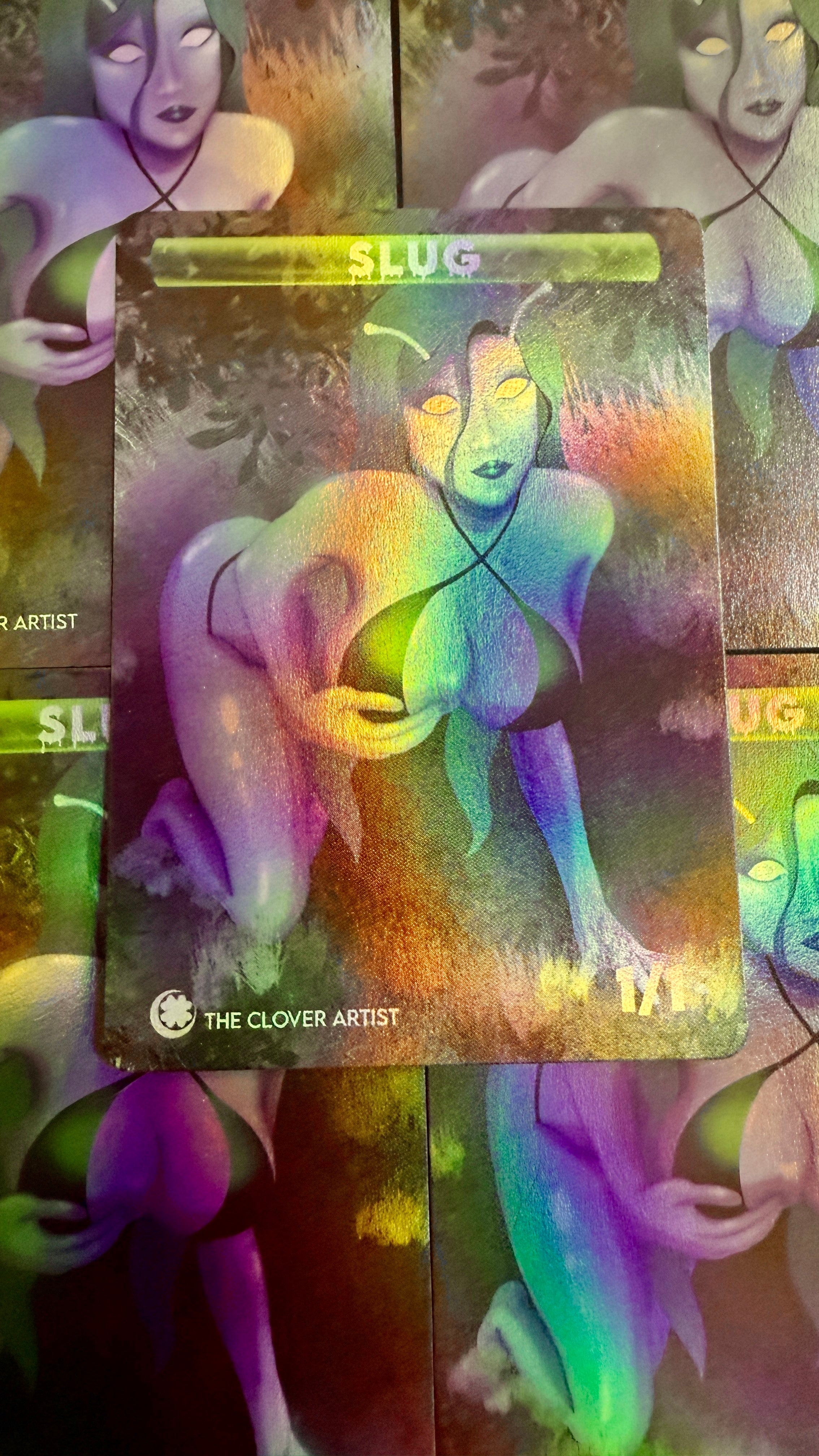 Colorful artwork of a figure with 'The Clover Artist' branding on a dark background.